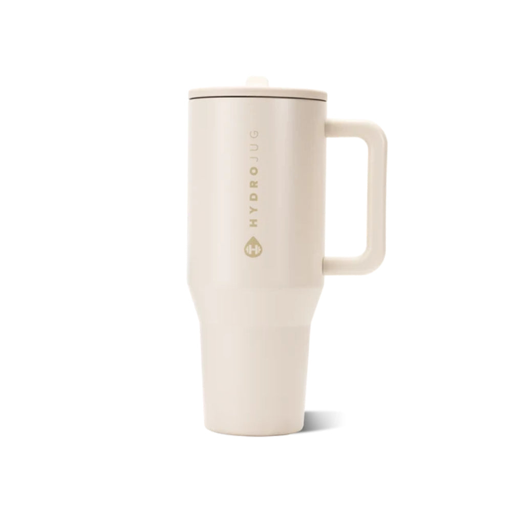 A HydroLug travel mug in a light cream color with a matching lid and handle, featuring the brand name printed vertically on the front, set against a plain white background.