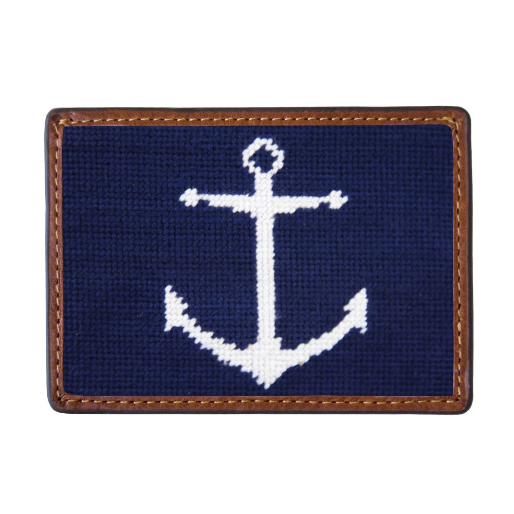 Cardholder with white anchor design on a navy background