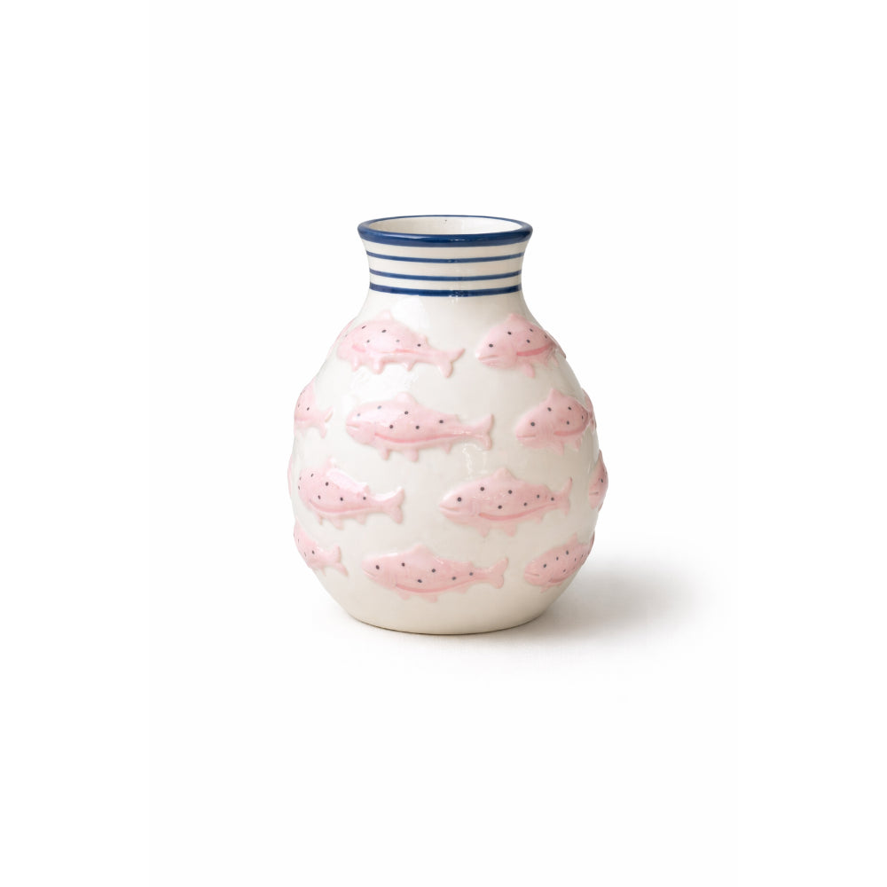 Ceramic vase with pink fish pattern on a white background