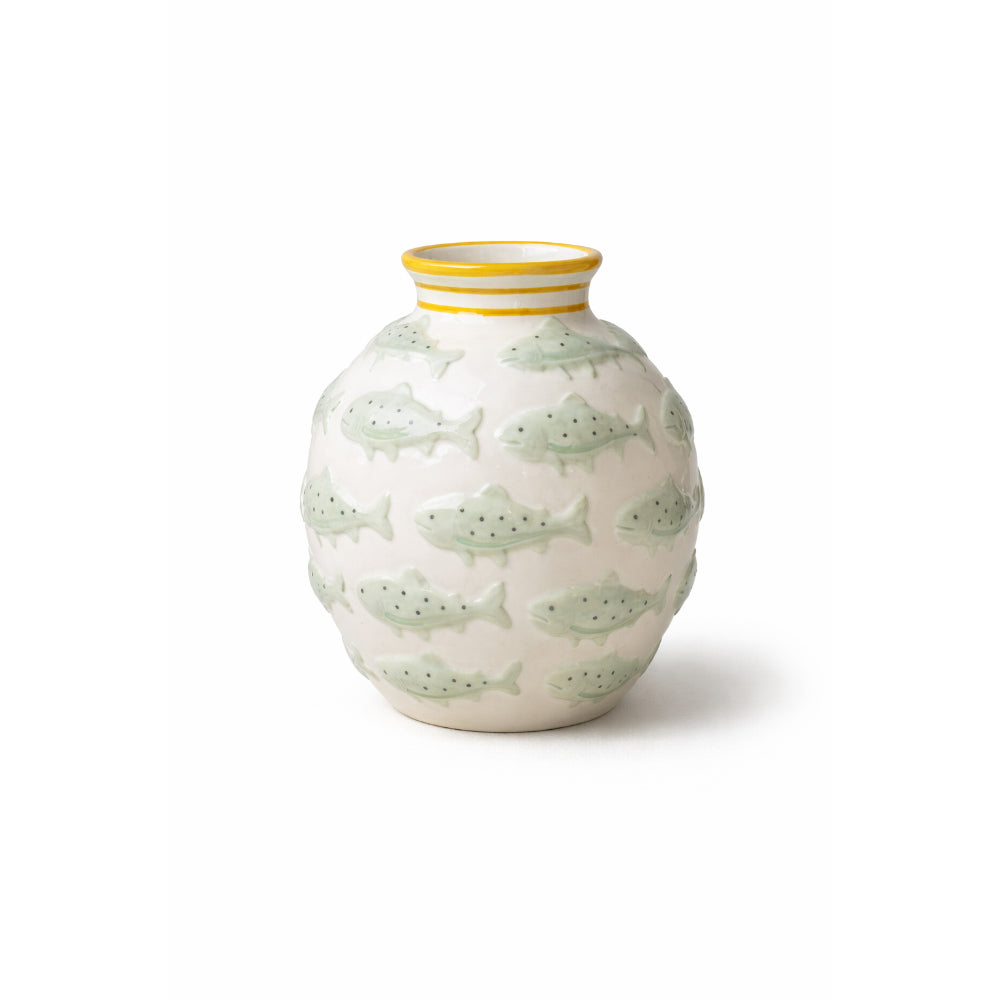 Ceramic vase with fish pattern on a white background