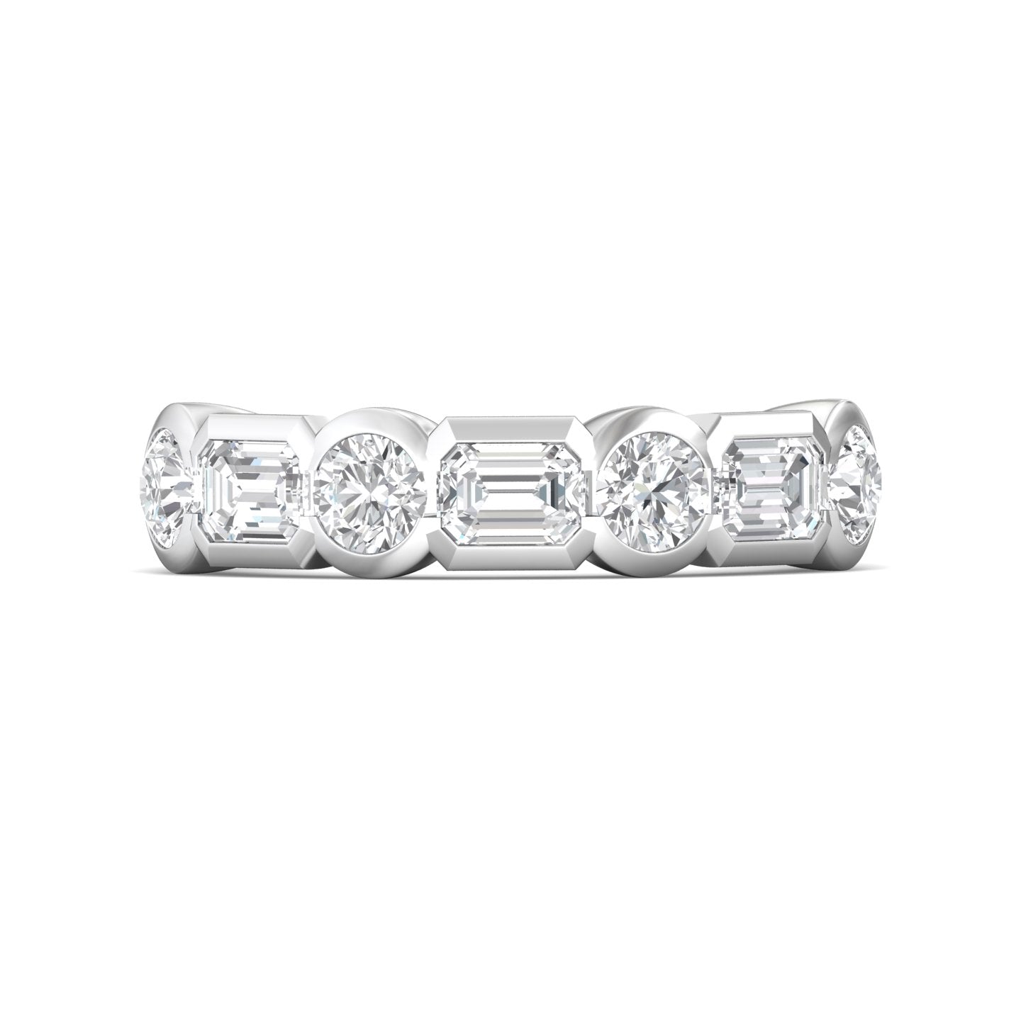 A silver diamond eternity band ring featuring a row of baguette and round-cut diamonds in a prong setting, shown against a plain white background.