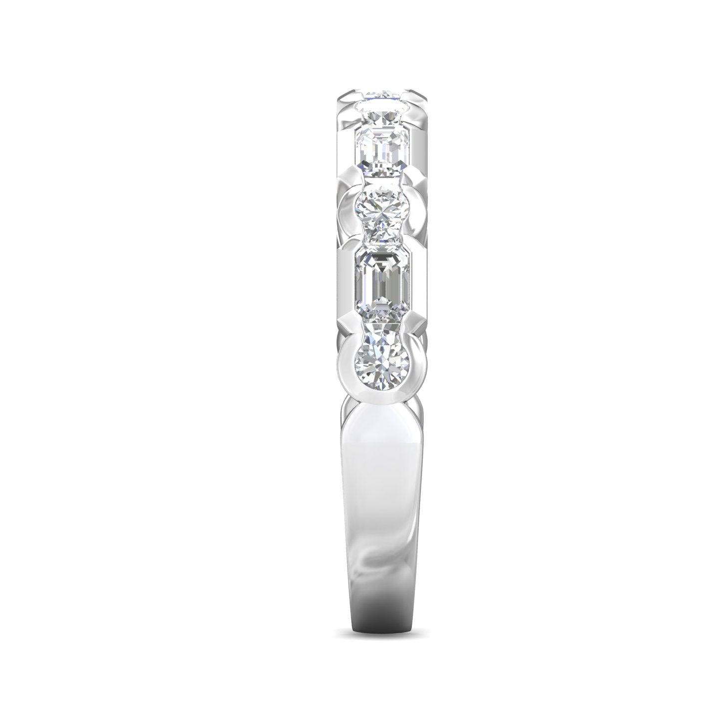 A silver-toned diamond ring featuring three vertical rows of clear gemstones, including round brilliant and emerald-cut stones, set against a plain white background.