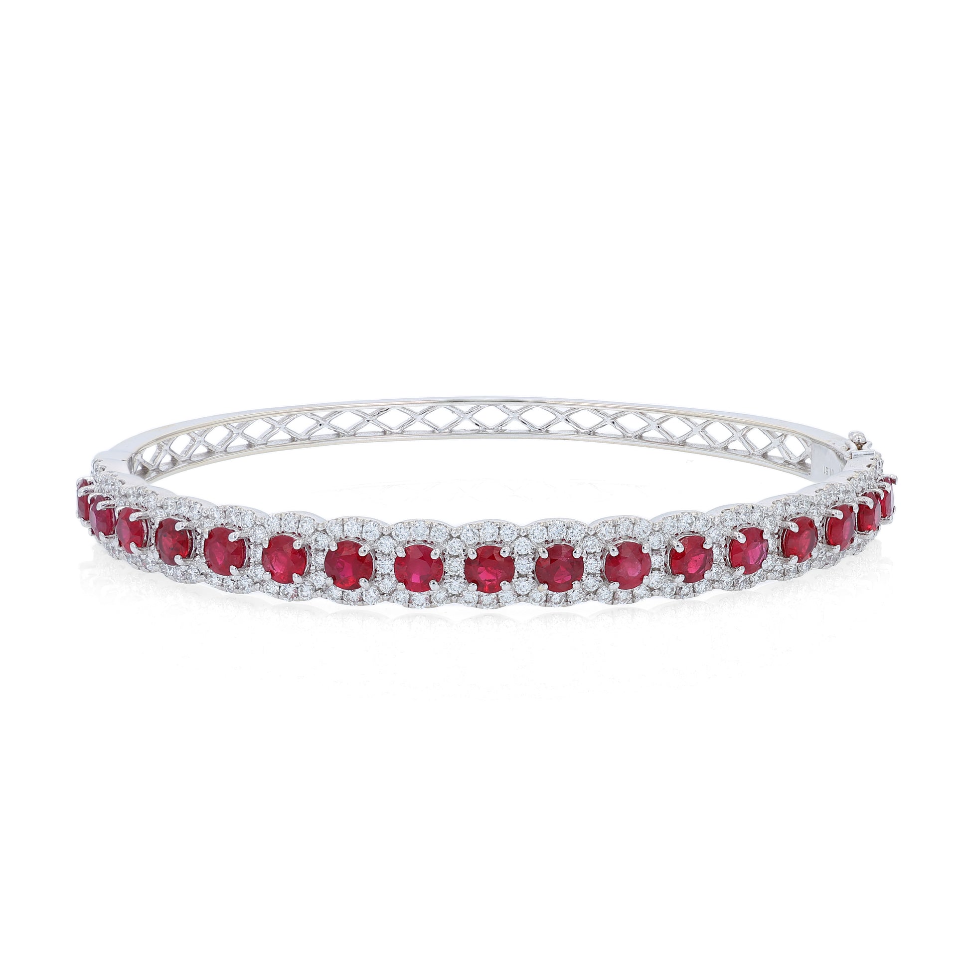 White gold bangle bracelet with red rubies and diamond halo accents on a white background