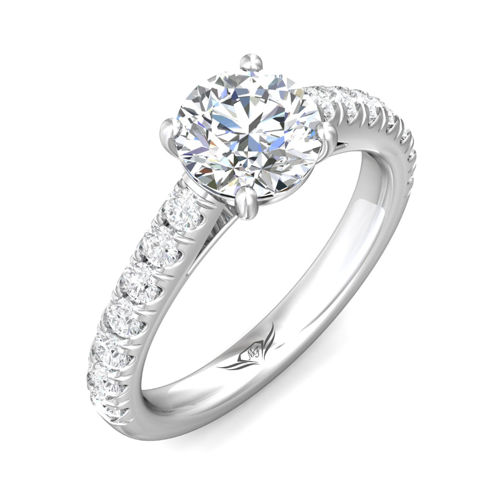 Silver ring with a large diamond and smaller diamonds on the band against a white background