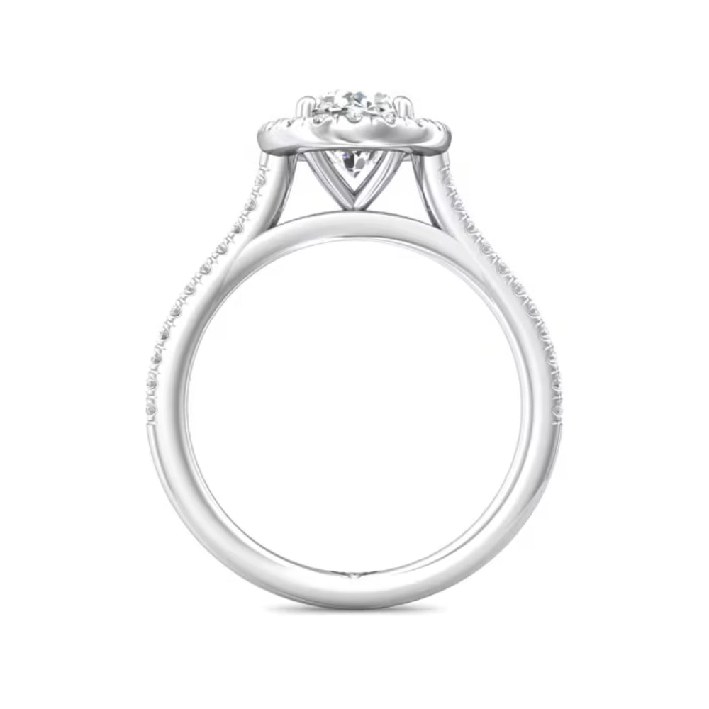 Silver ring with a heart-shaped diamond on a white background