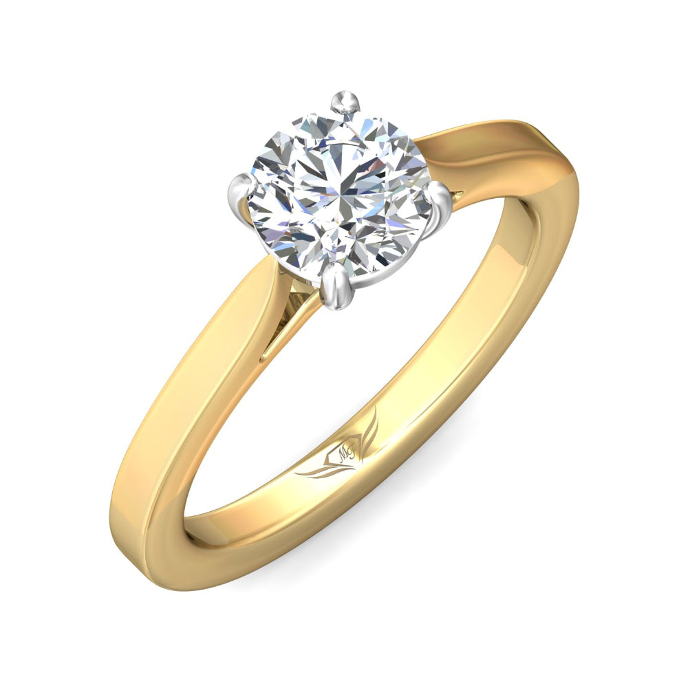 Gold ring with a diamond on a white background