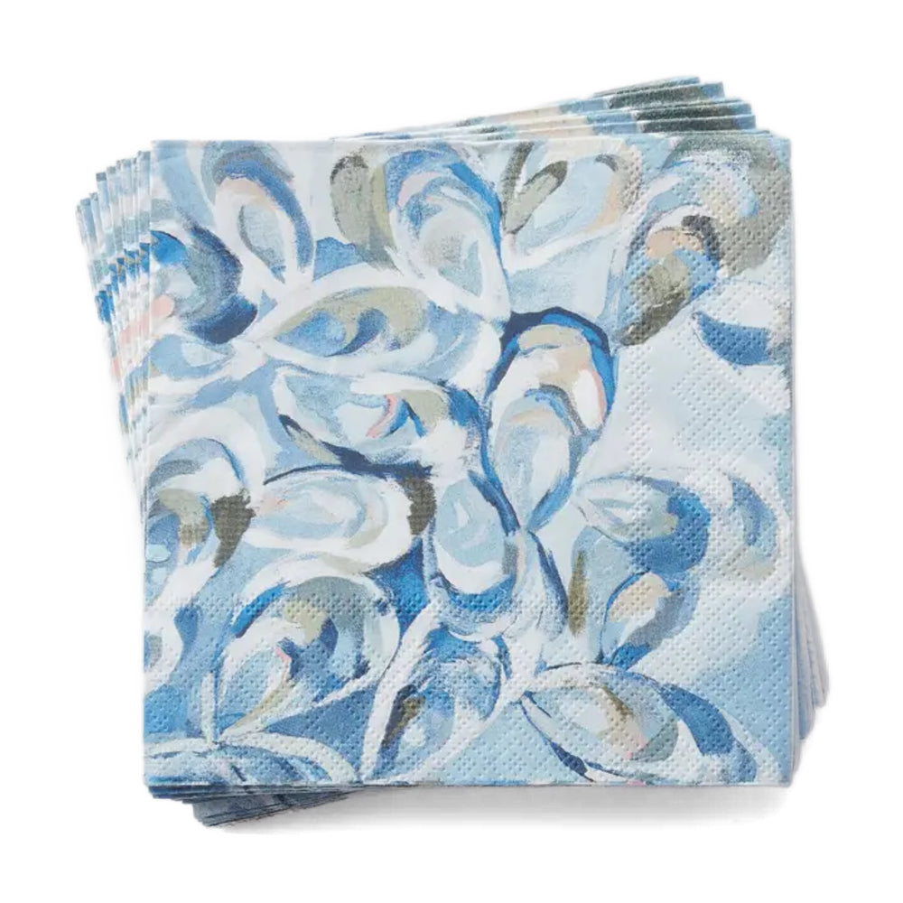 Stack of blue patterned napkins on a white background
