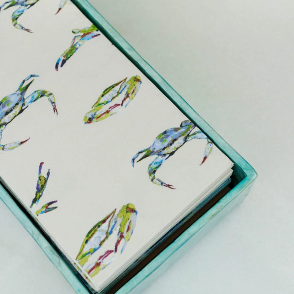 guest towels with colorful crab design on a light blue cover