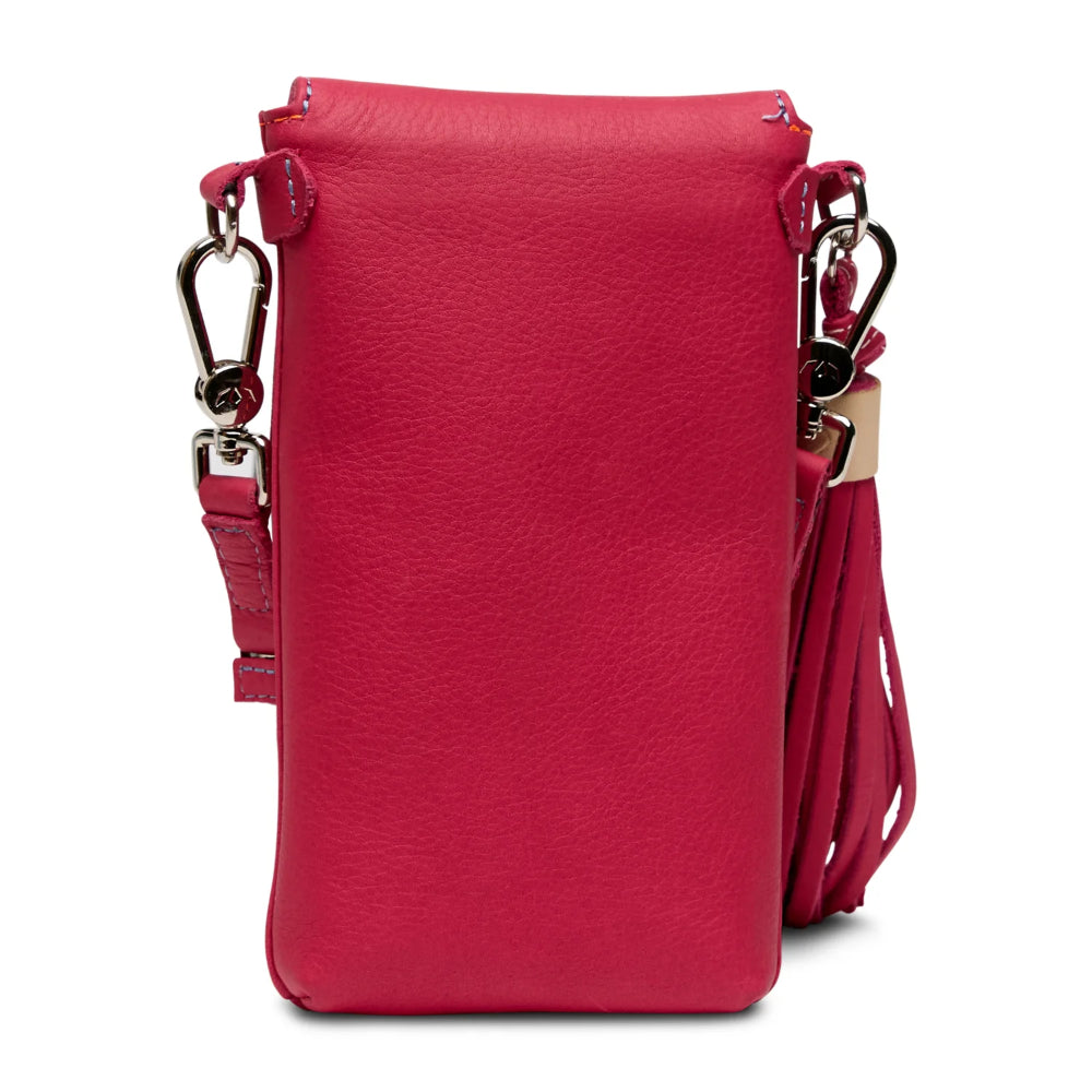 Red leather handbag with a strap on a white background