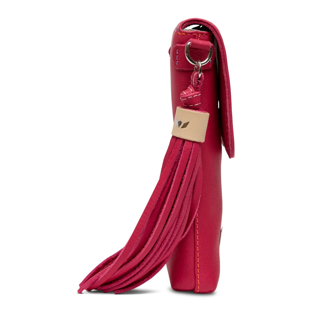 Red leather handbag with fringe details on a white background