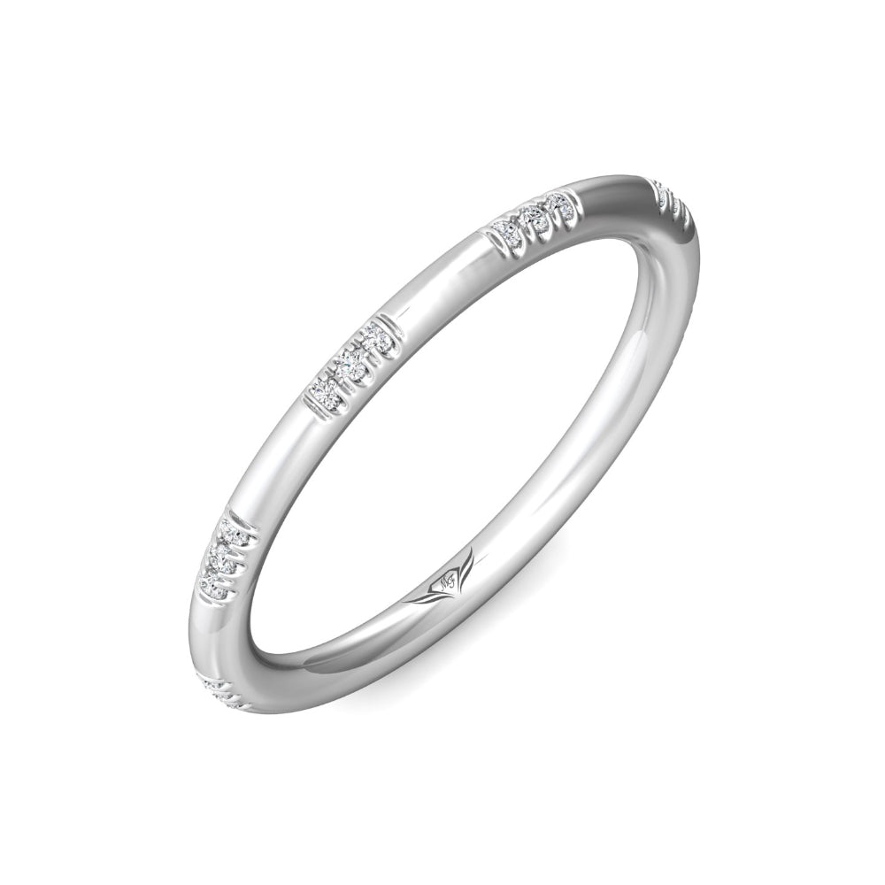 Silver ring with small diamonds on a white background