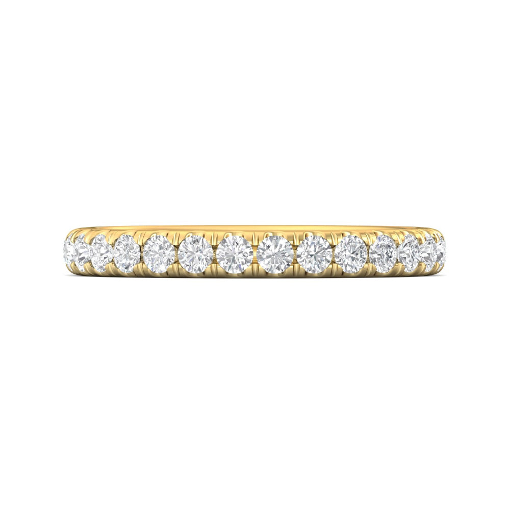 Gold ring with diamonds on a white background