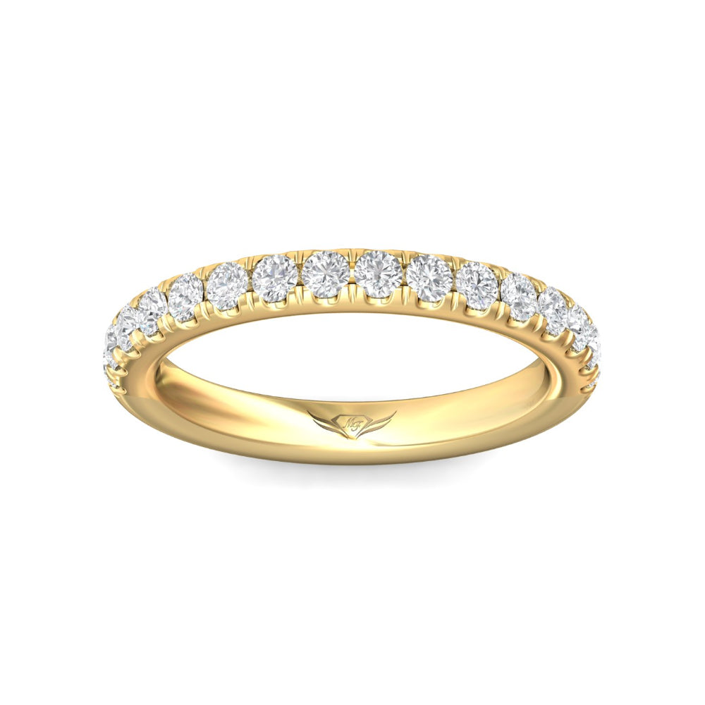 Gold ring with diamonds on a white background