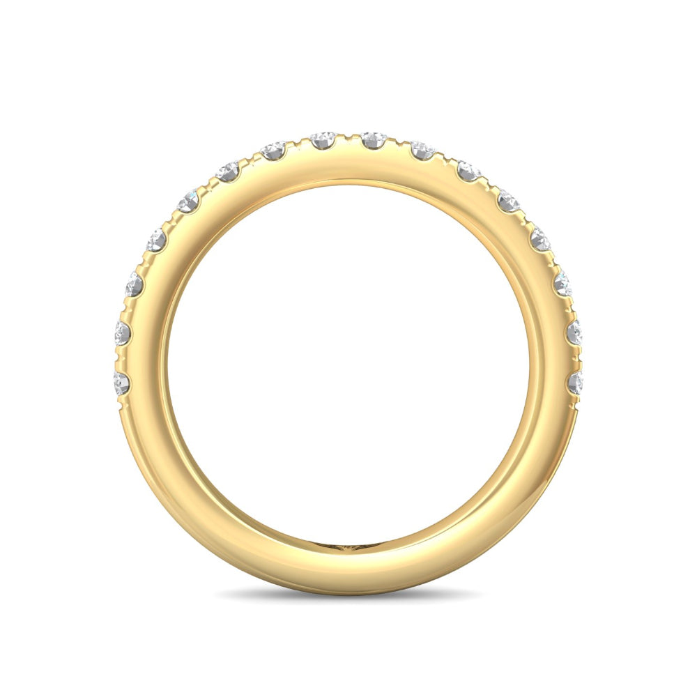 Gold ring with small diamonds on a white background