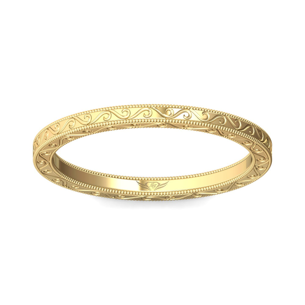 A gold bangle bracelet with intricate engraved scrollwork and beaded borders, shown on a plain white background.