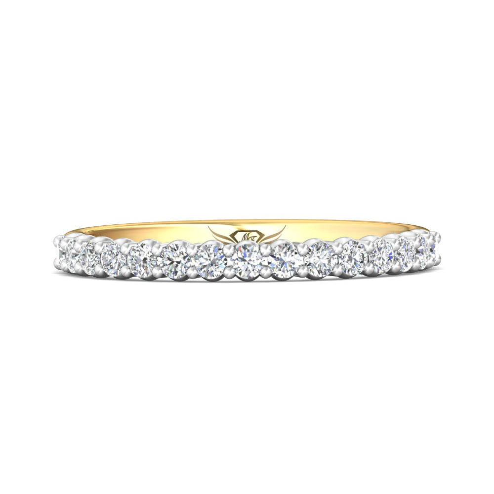 Gold ring with diamonds on a white background