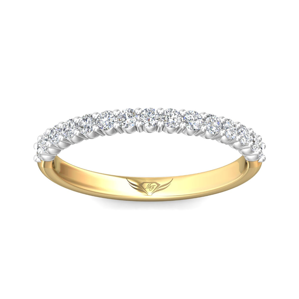 Gold and silver ring with diamonds on a white background