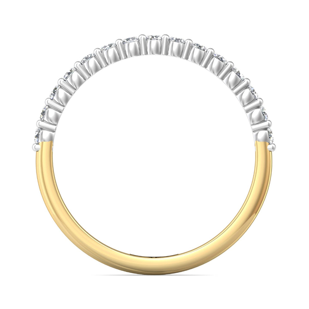 Two-tone ring with gold and silver band on a white background