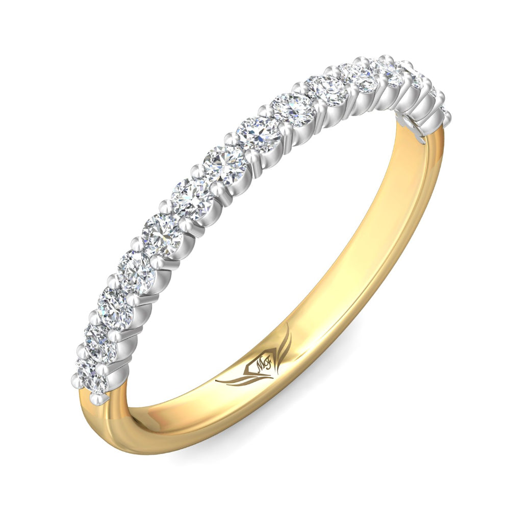 Gold ring with diamonds on a white background