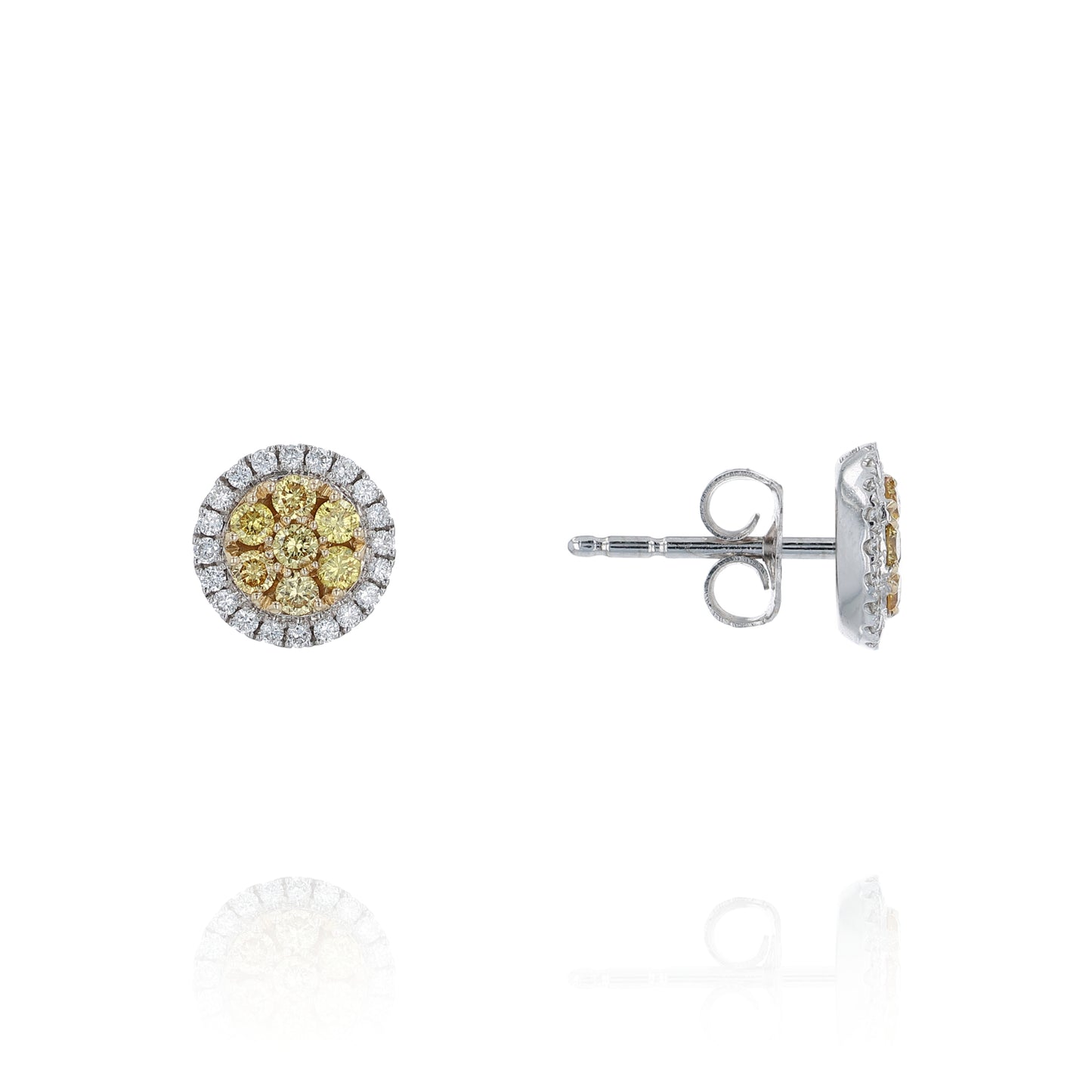 White gold stud earrings with yellow and white diamond clusters on a white background
