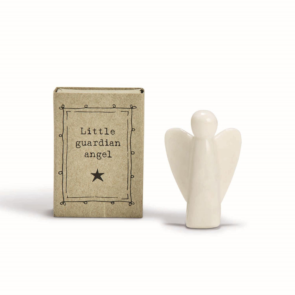 White guardian angel figurine next to a small box labeled 'Little guardian angel' on a white background.