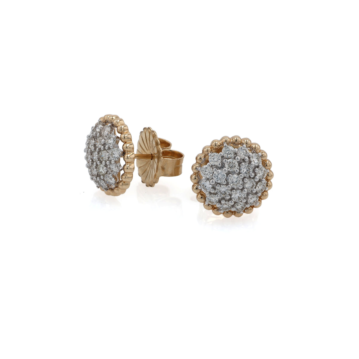 A pair of round gold earrings with pavé-set clear stones, shown on a clean white background. One earring is facing forward to show the stone cluster and scalloped gold border, while the other is turned to show the post and backing.