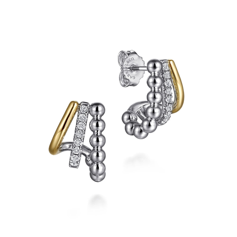 Pair of Sterling silver and 18k yellow gold earrings with white sapphires 