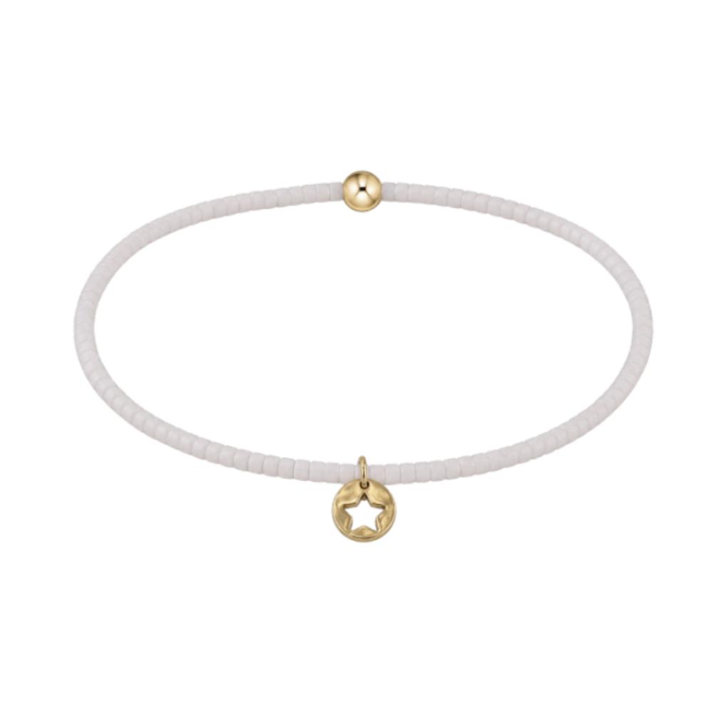 2mm seed beads and a 4mm, 14kt gold-filled bead with our star small gold disc