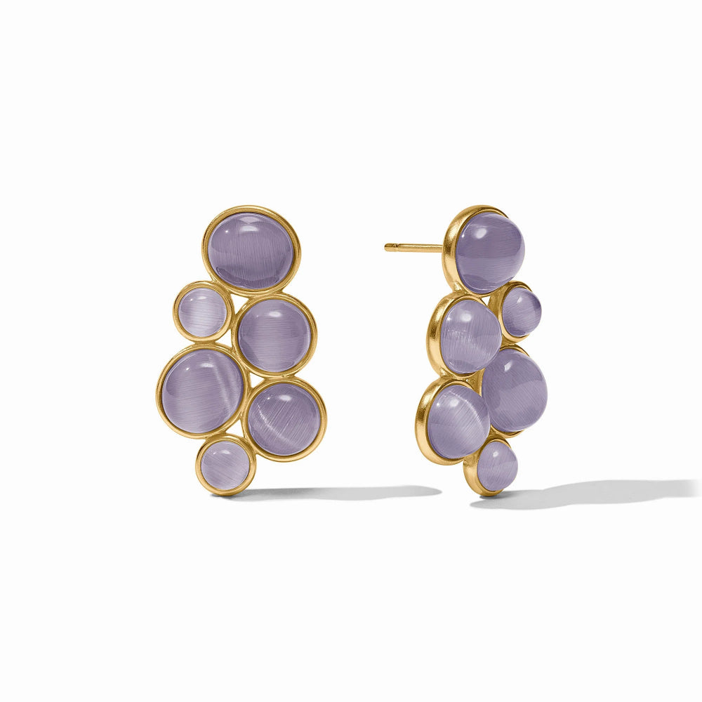 Pair of gold and purple earrings on a white background