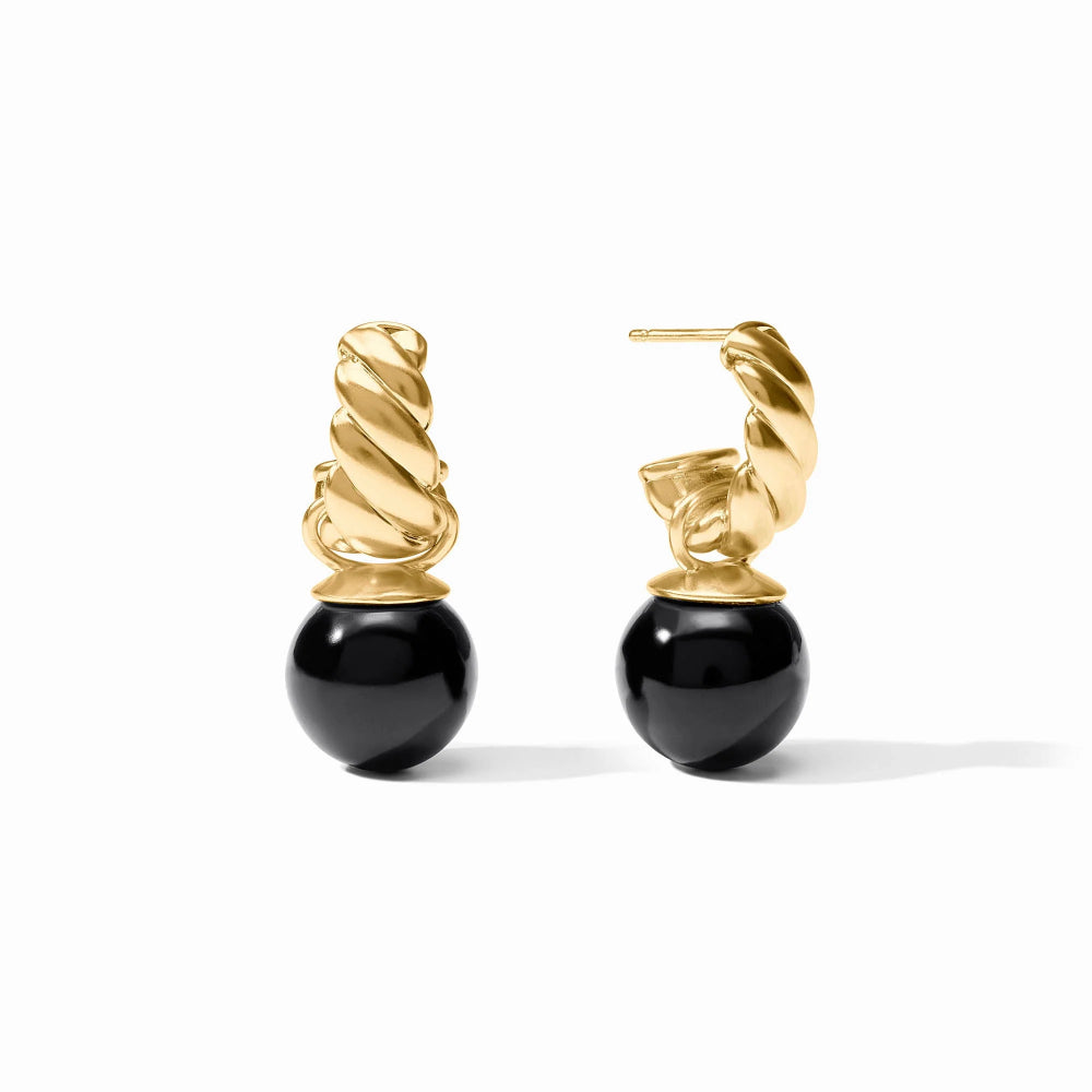 A pair of gold and black drop earrings, featuring a twisted gold spiral design above a smooth black spherical bead, shown on a plain white background.