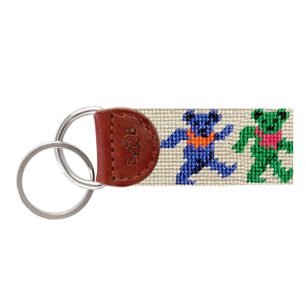 Keychain with colorful frog design on a white background