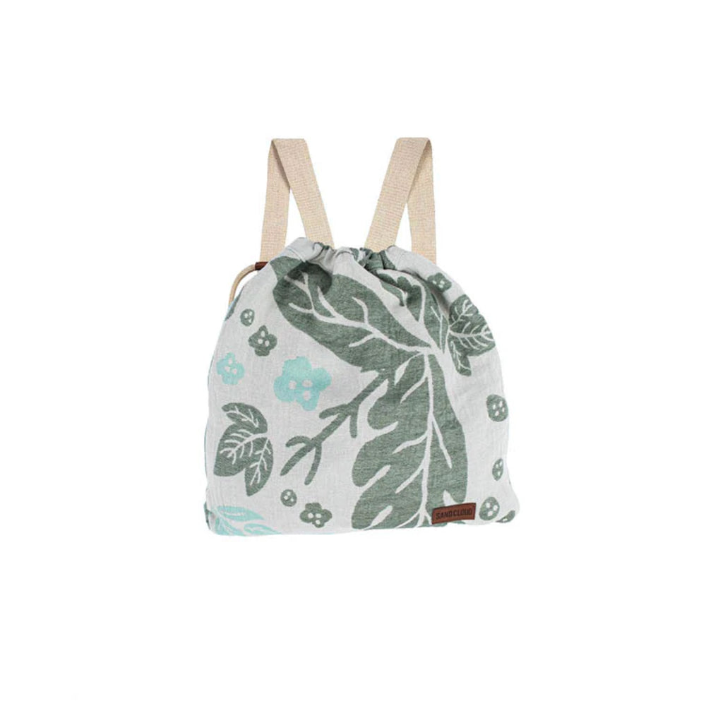 Drawstring bag with leaf pattern on a white background.