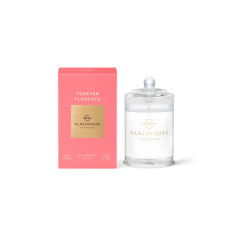Glasshouse candle and packaging with 'Forever Florence' text on a white background