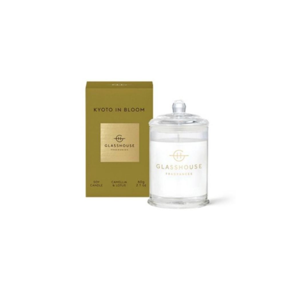 Glasshouse candle and green packaging with clear "Kyoto in Bloom" candle on a white background