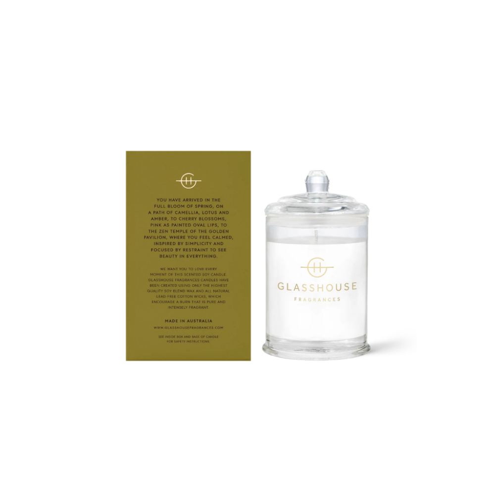 The back of a glasshouse candle and  packaging with text and  clear 'Kyoto in Bloom' candle on a white background.