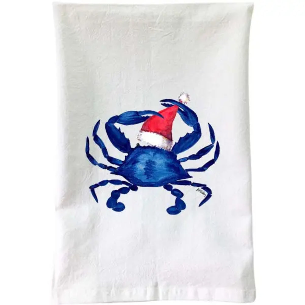 A white kitchen towel featuring a painted blue crab wearing a red and white Santa hat, shown against a plain white background.
