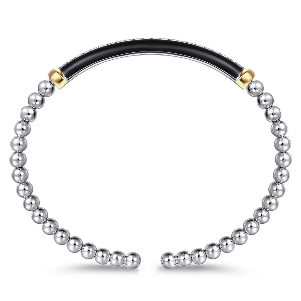 Black beaded hoop earring with gold accents on a white background