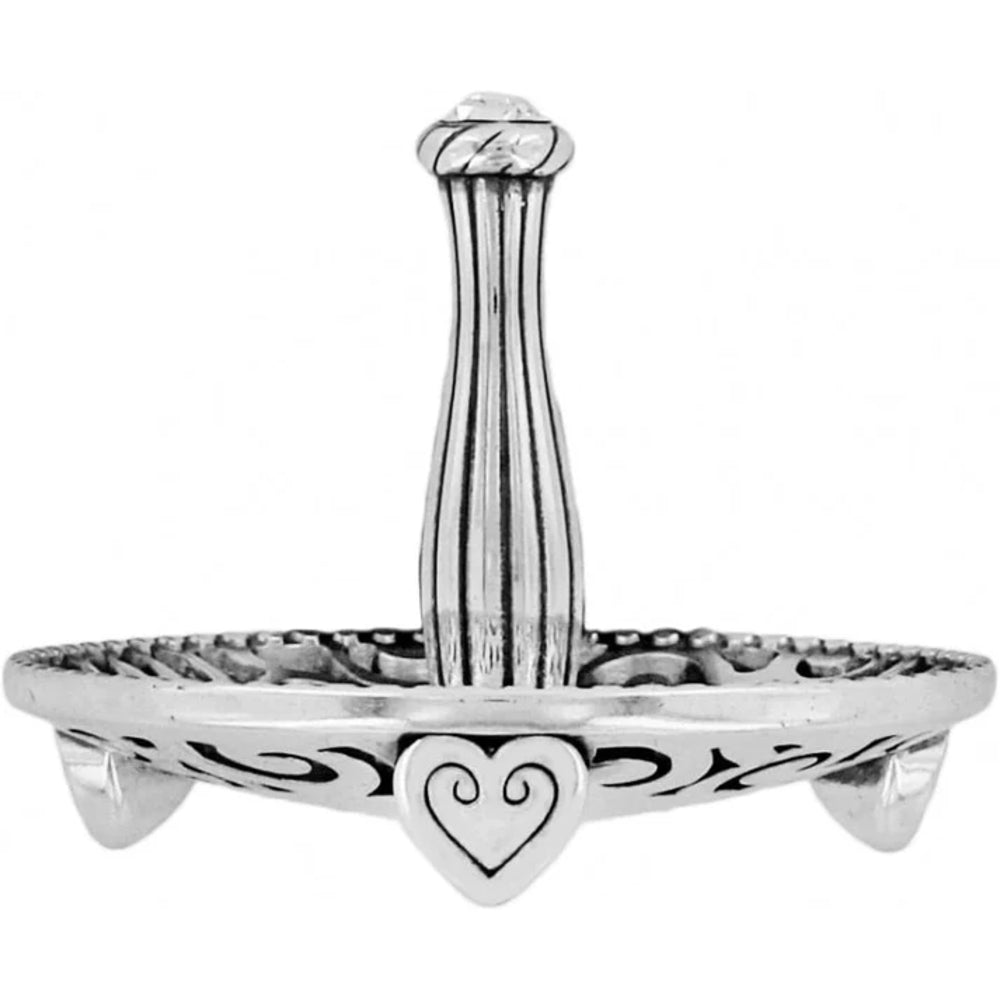 Silver ring holder with heart design on a white background