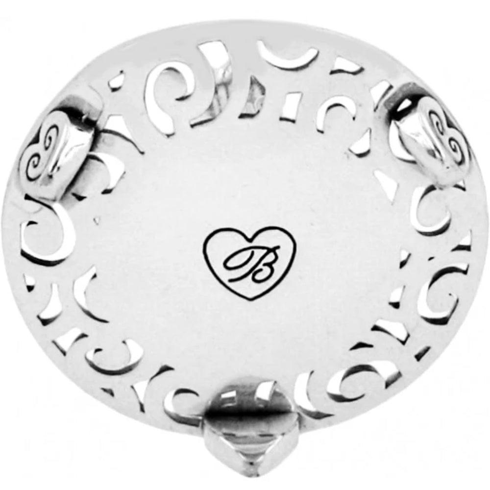 Silver charm with decorative patterns and a heart-shaped logo on a white background