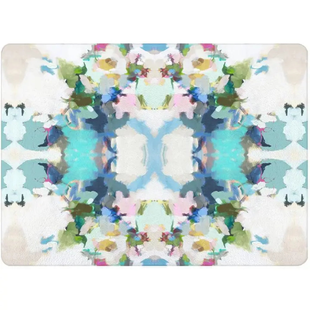 A floral cutting board on a white background. 