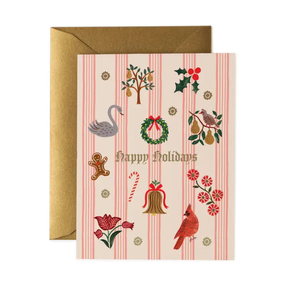 A Christmas greeting card with a gold envelope, featuring a cream background with pink vertical stripes and festive illustrations including a swan, wreath, candy cane, bell, flowers, and birds. The card reads 'Happy Holidays' in gold lettering.