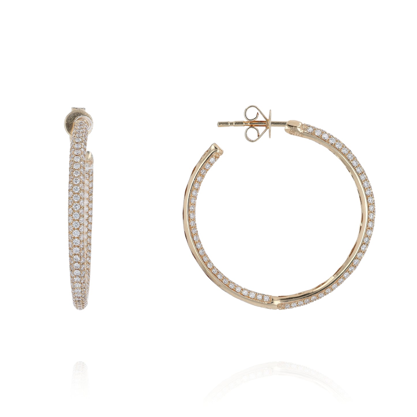 Yellow gold inside & out pave diamond hoop earrings on a white background
