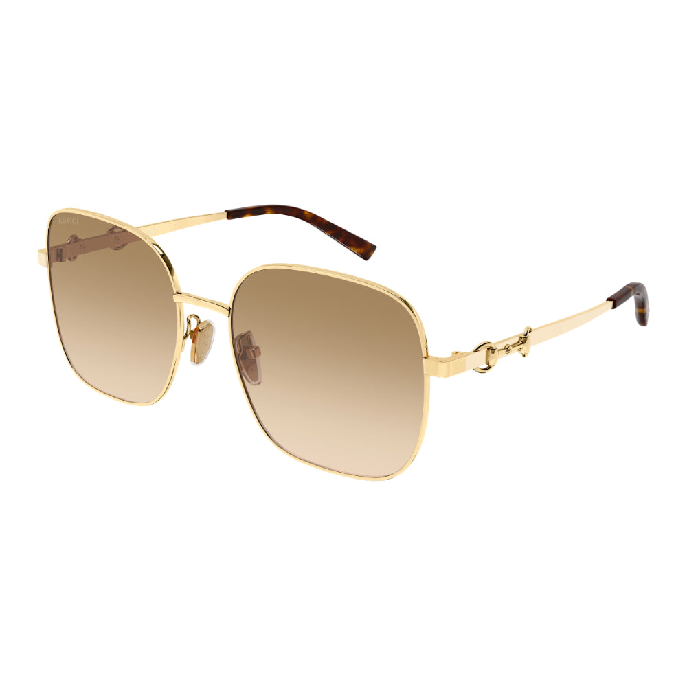 Gold-framed sunglasses with a gradient brown lens on a white background