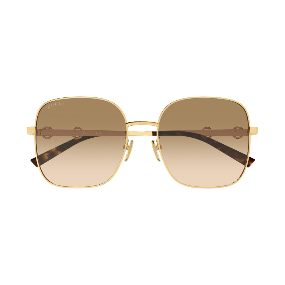Gucci square sunglasses with a gold metal frame, brown gradient lenses, and dark tortoiseshell temple arms on a white background.