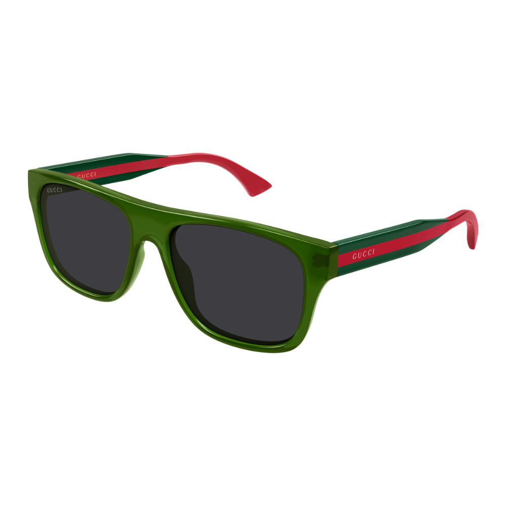 Gucci sunglasses with a translucent green frame, dark gray lenses, and red and green striped temples with the brand name printed in white.