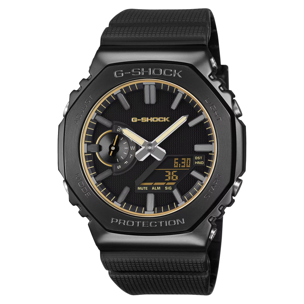 Black G-Shock watch with gold accents on a white background