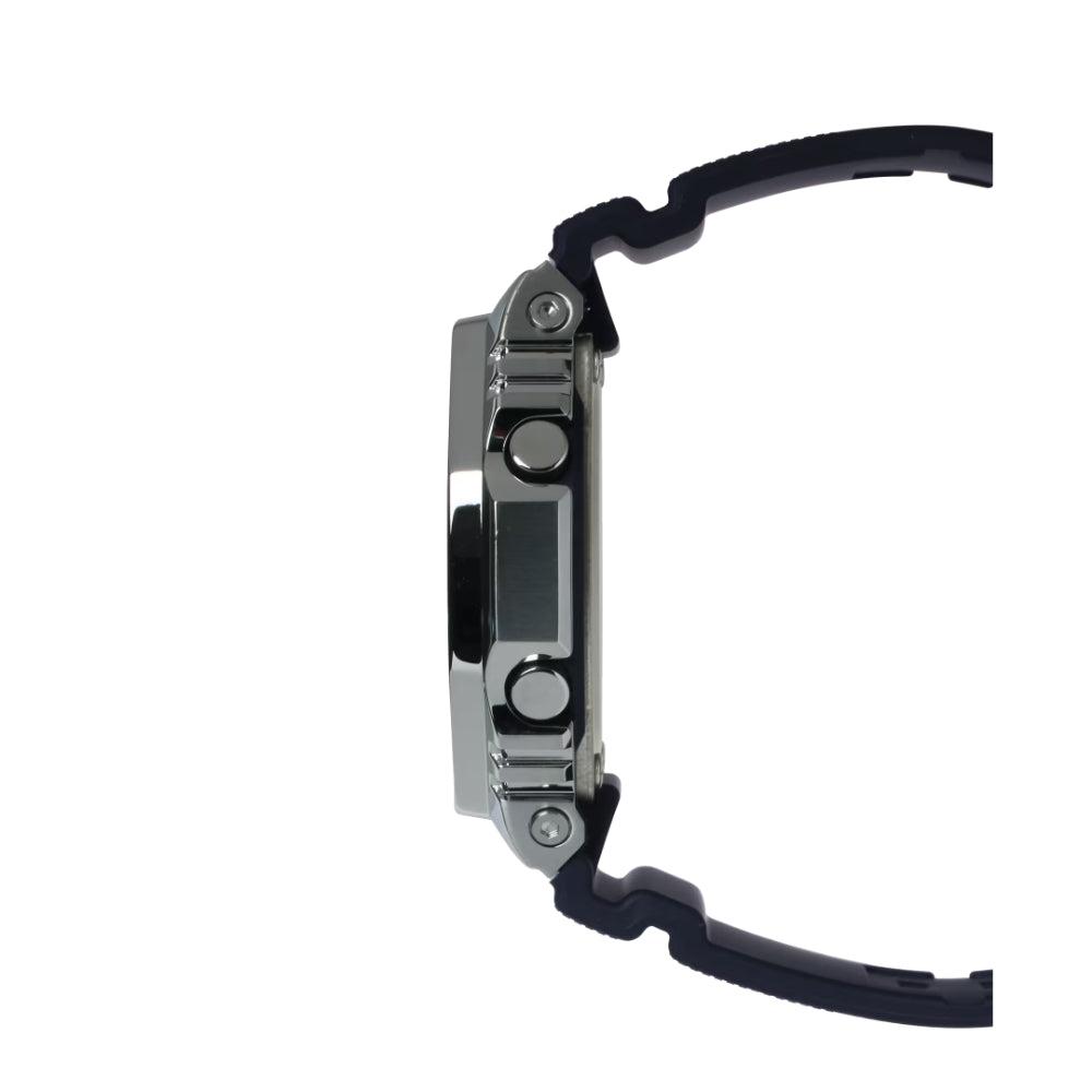 Close-up of a watch with a black strap on a white background