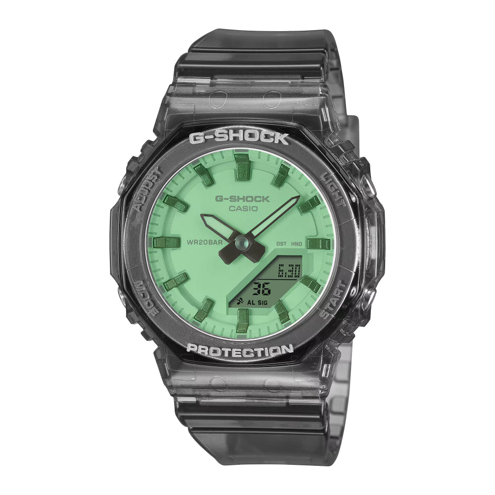 G-Shock Casio watch with green face and black transparent case on a white background