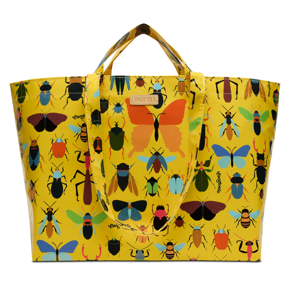 Yellow tote bag with colorful insect pattern on a white background