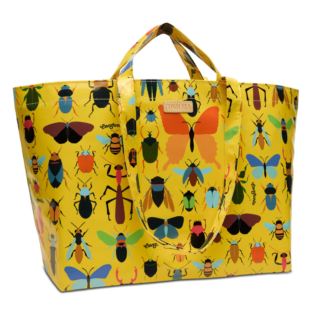 Yellow tote bag with insect pattern on a white background